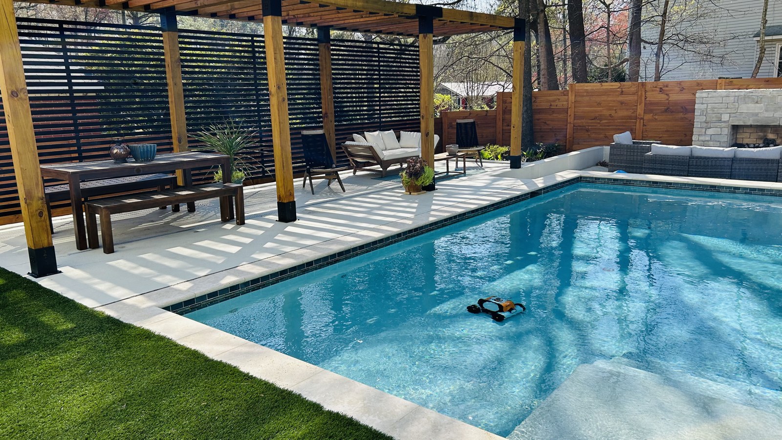 Customer view of a pool and adjacent metalwork at a residential property
